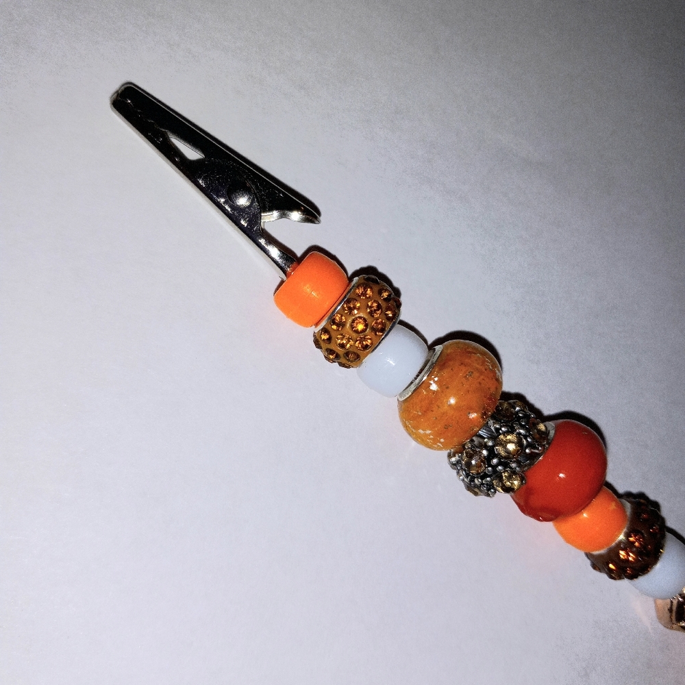 Beaded roach clip